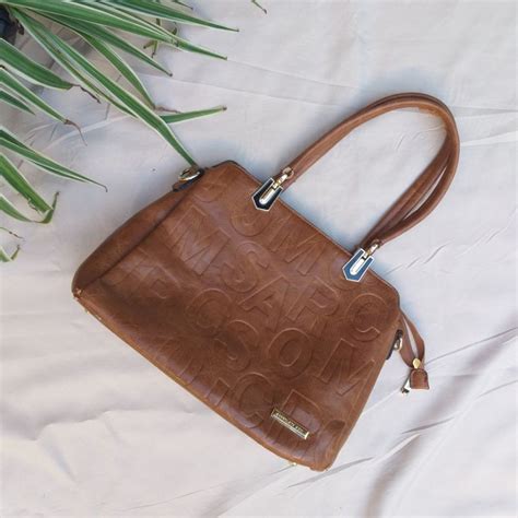 bolsa da marca borboleta